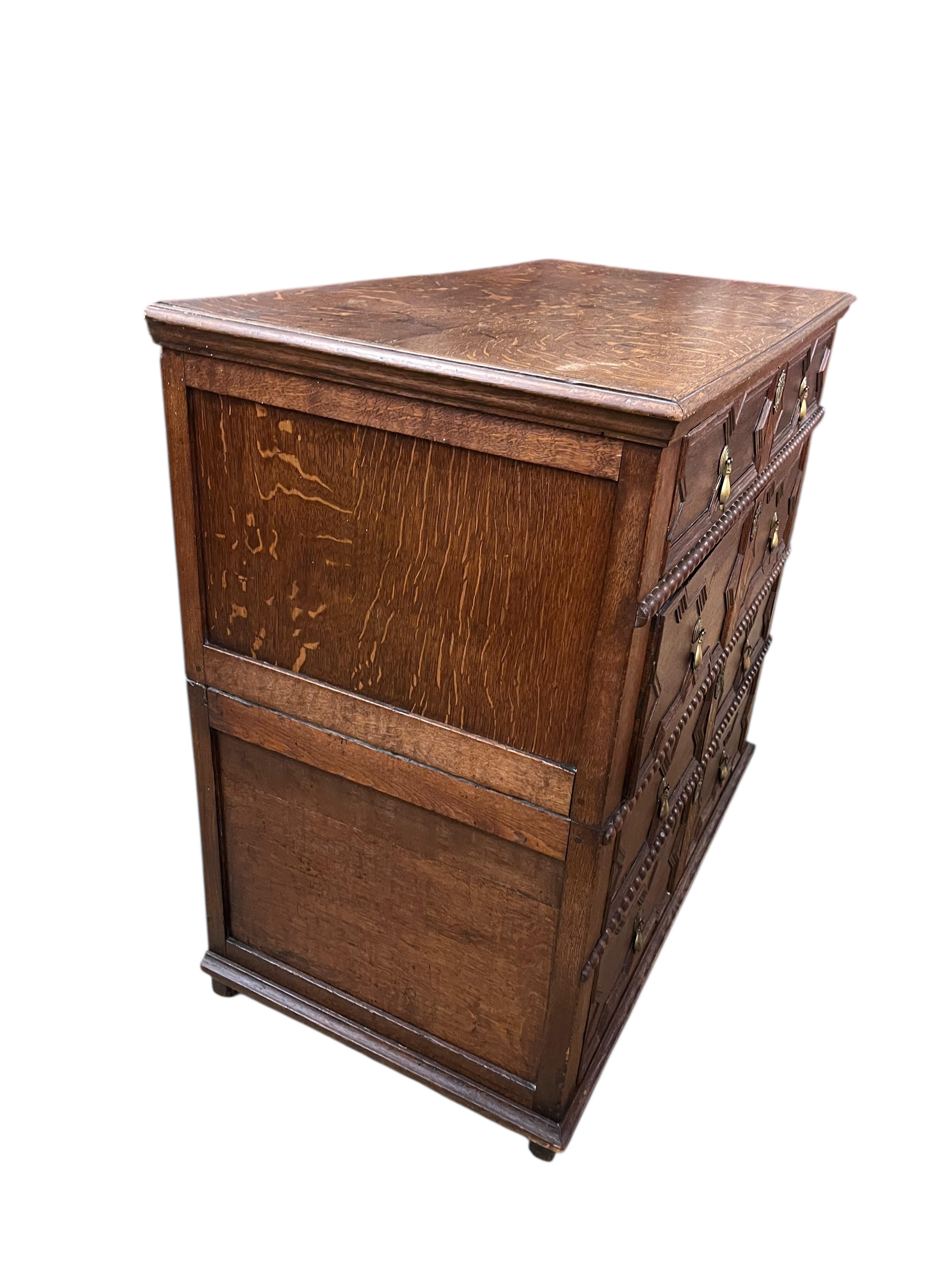 An early 18th century oak two part chest of drawers, width 102cm, depth 53cm, height 93cm